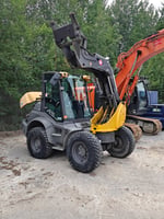 MECALAC AS900, -19 PYÖRÄKUORMAAJA, KÄÄNTYVÄ PUOMI (993-EAV)